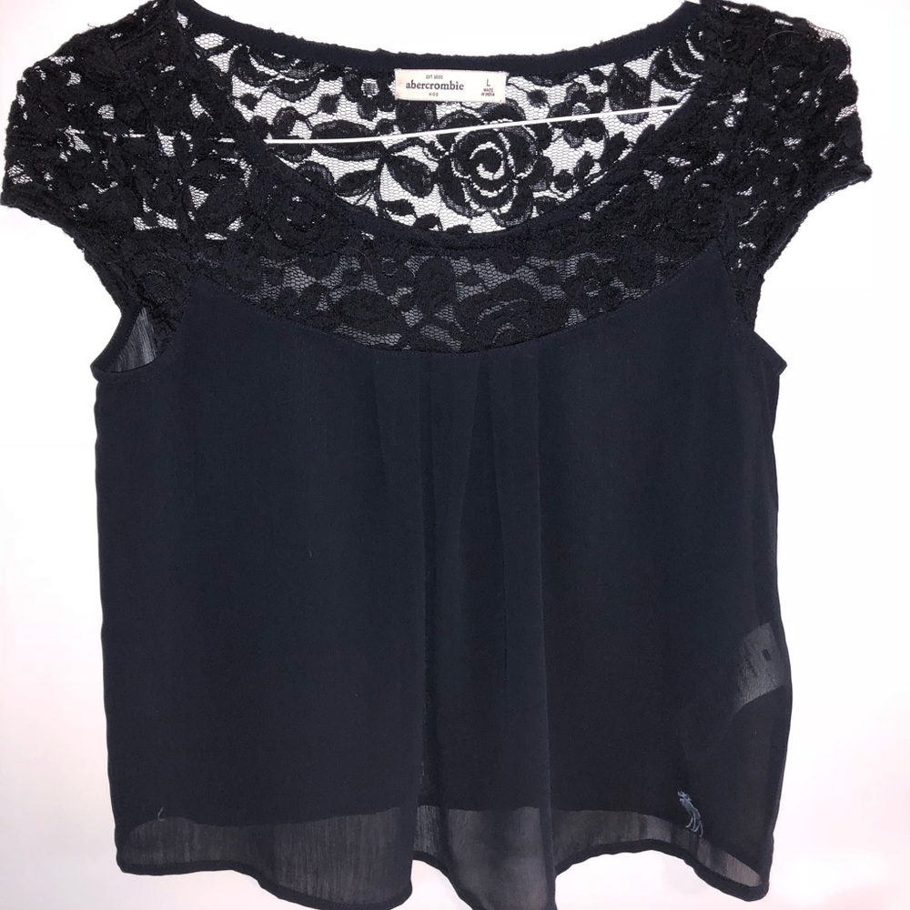 flowy cap sleeve top with lace neckline